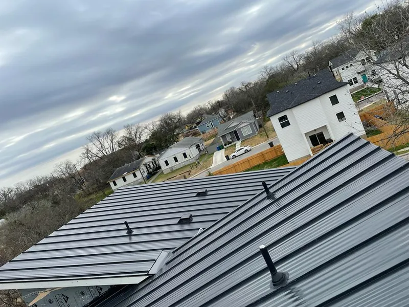 Standing seam metal roof panels with vents for Skylight Repair in Mount Prospect